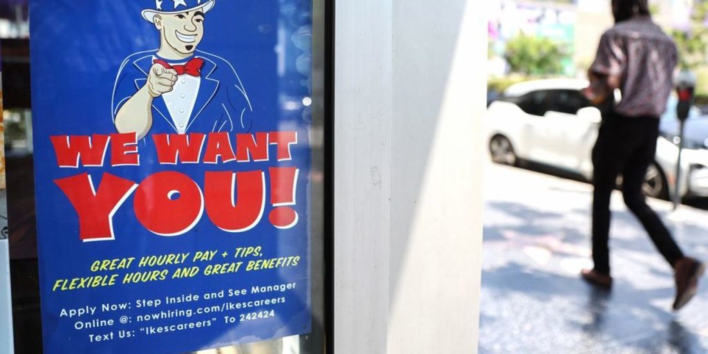 Worker pay is still going up fast — and that means higher interest rates